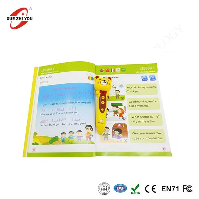 スマートなおもちゃの子供ペンと本を読む